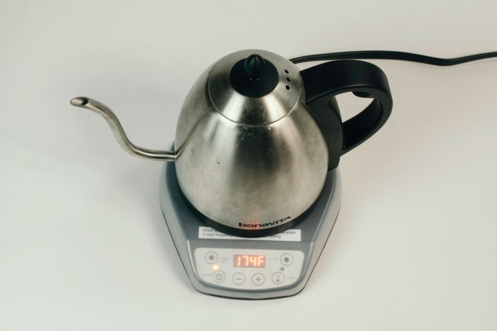 electric gooseneck kettle with LED display showing set temp
