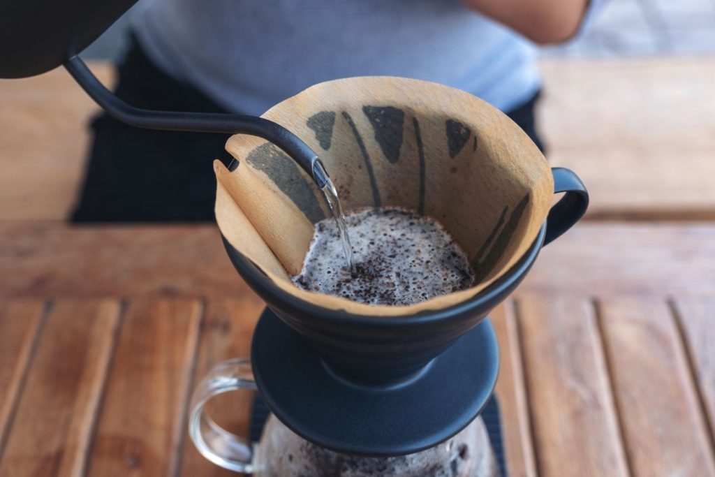 Low acid coffee brewing