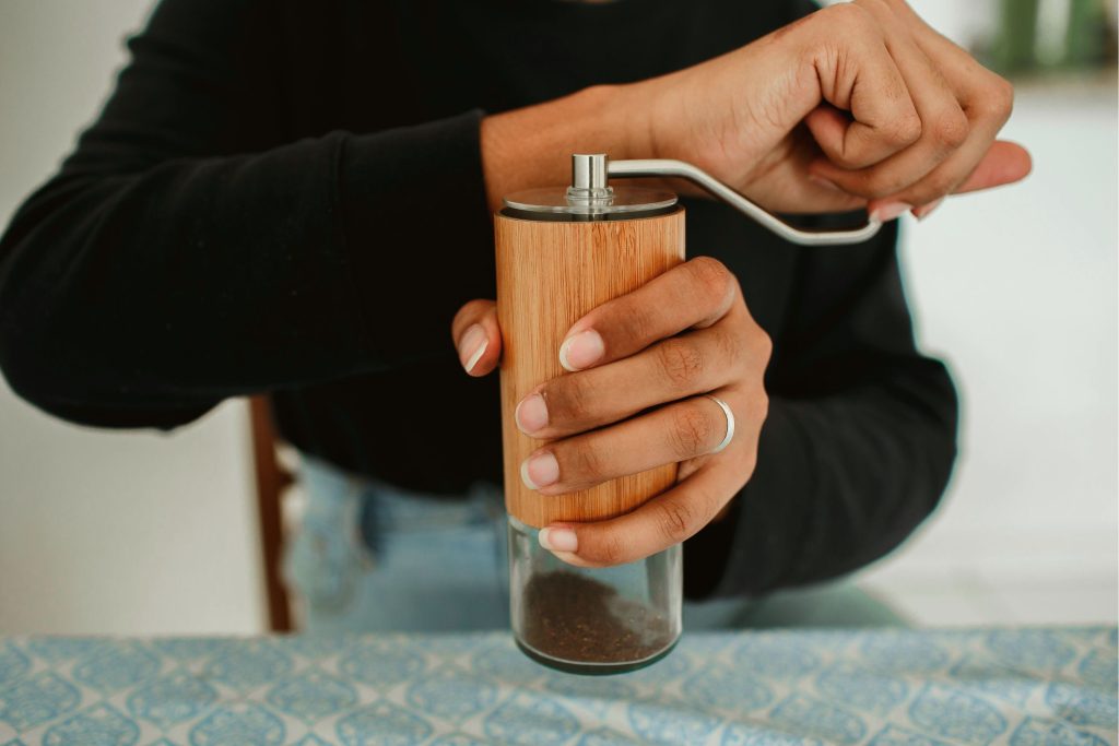 Grinding coffee with a manual coffee grinder Grinding coffee with a manual coffee grinder