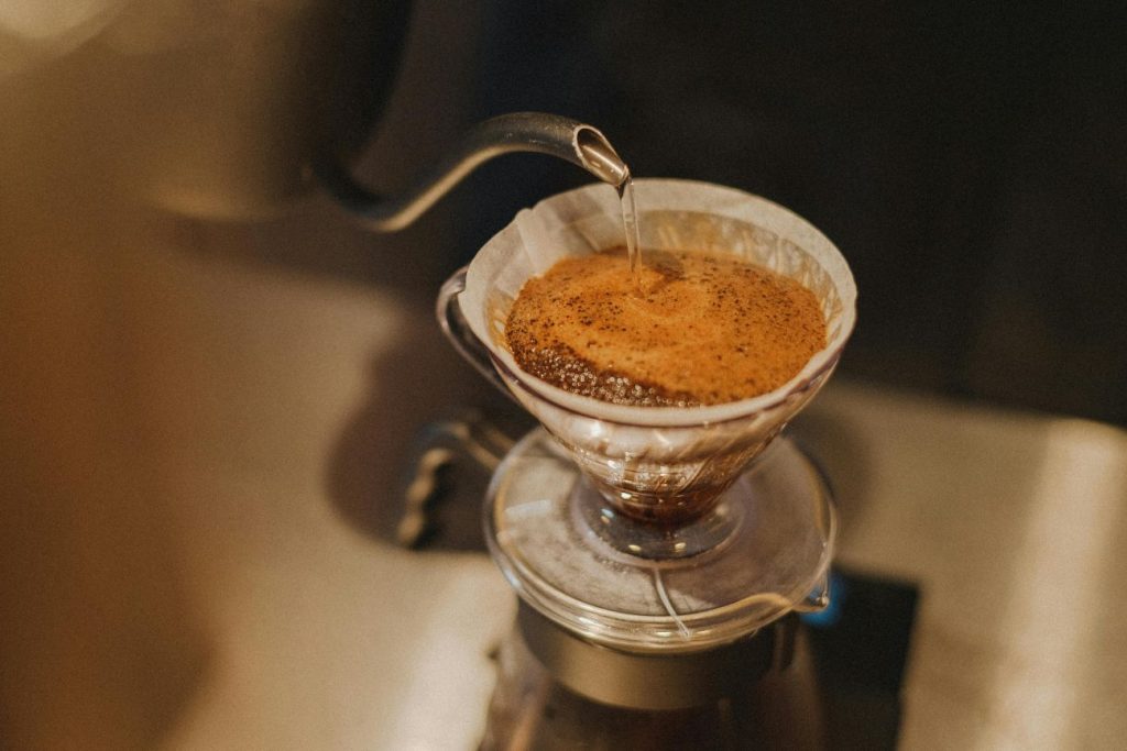 slow spiral pour technique for pour-over coffee with gooseneck kettle